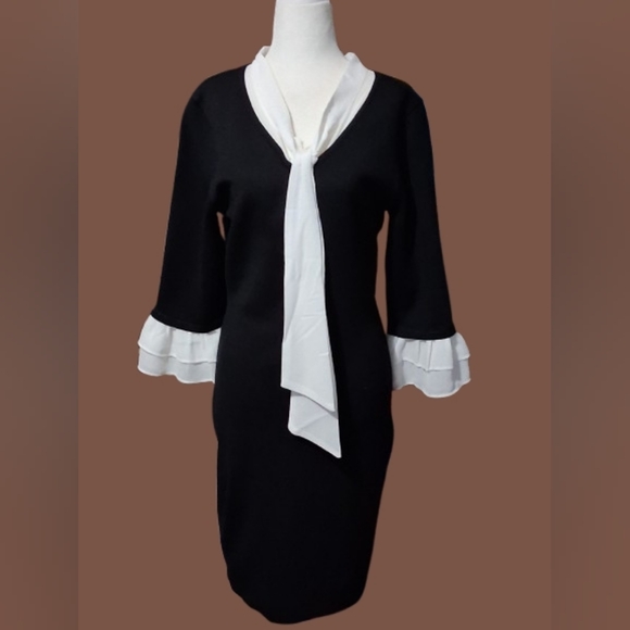 Nina Leonard Dresses & Skirts - New "NWT" Nina Leonard Black Sweater Dress with White Cuff Details